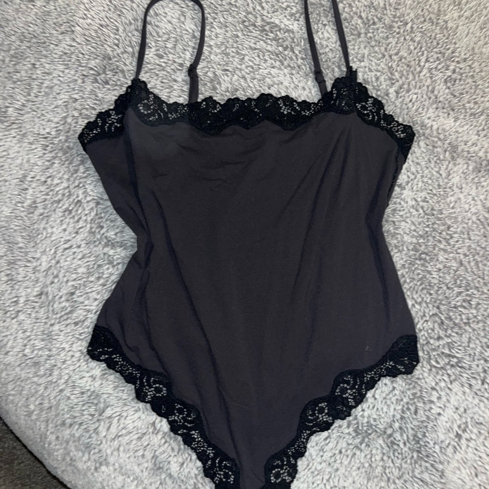 Black Lace Trim Bodysuit from SKIMS